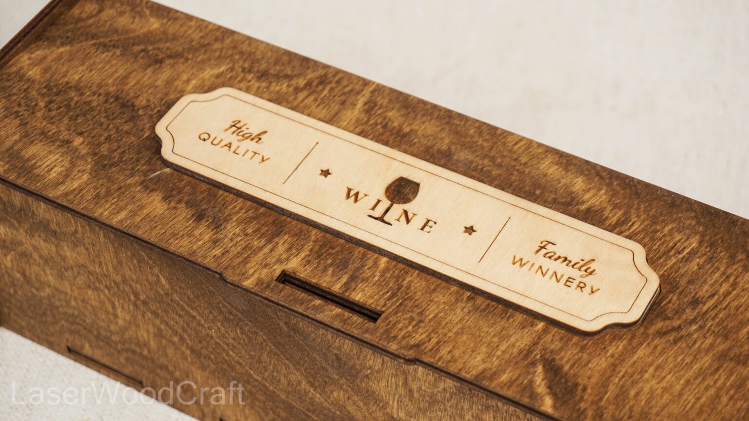 Custom wooden wine box made from birch plywood, open design with a wine bottle, crafted in Spokane, Washington
